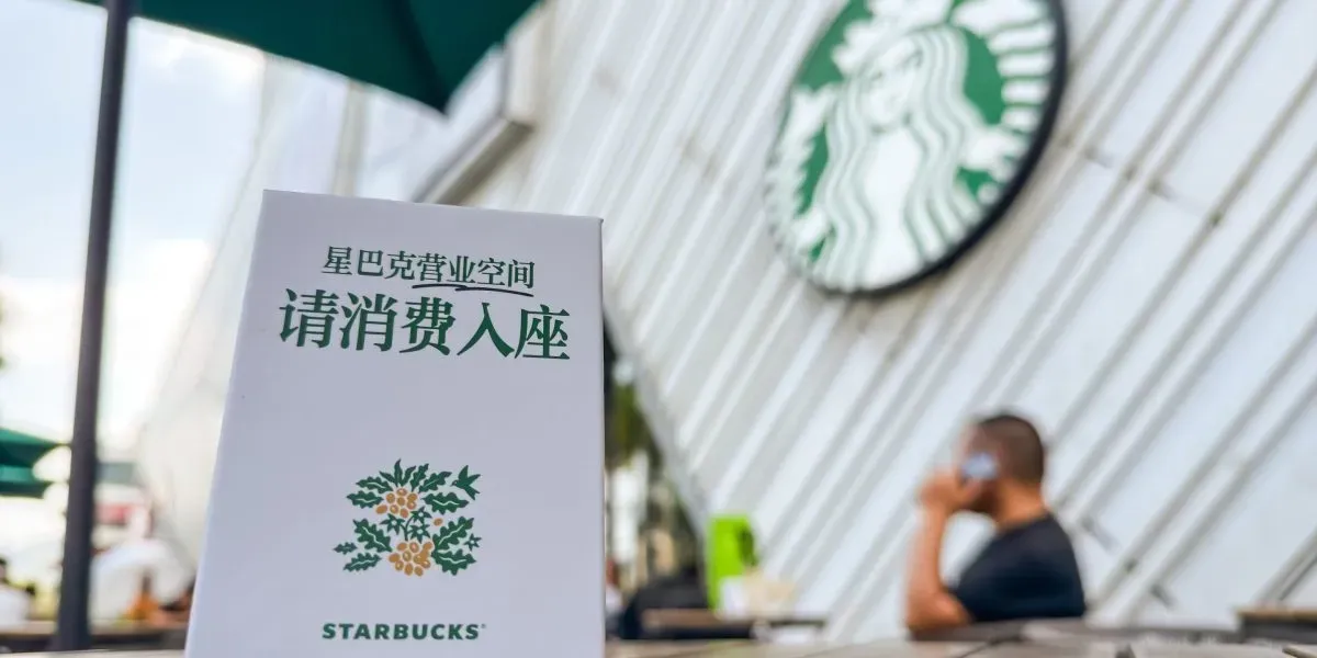Starbucks China tells customers to buy something before they sit down, as it invests $45 million in the store experience