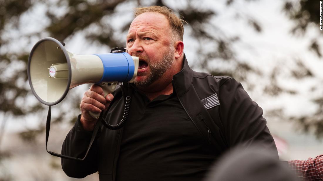 Right-wing conspiracy outlet Infowars files for bankruptcy protection as founder Alex Jones faces defamation suits