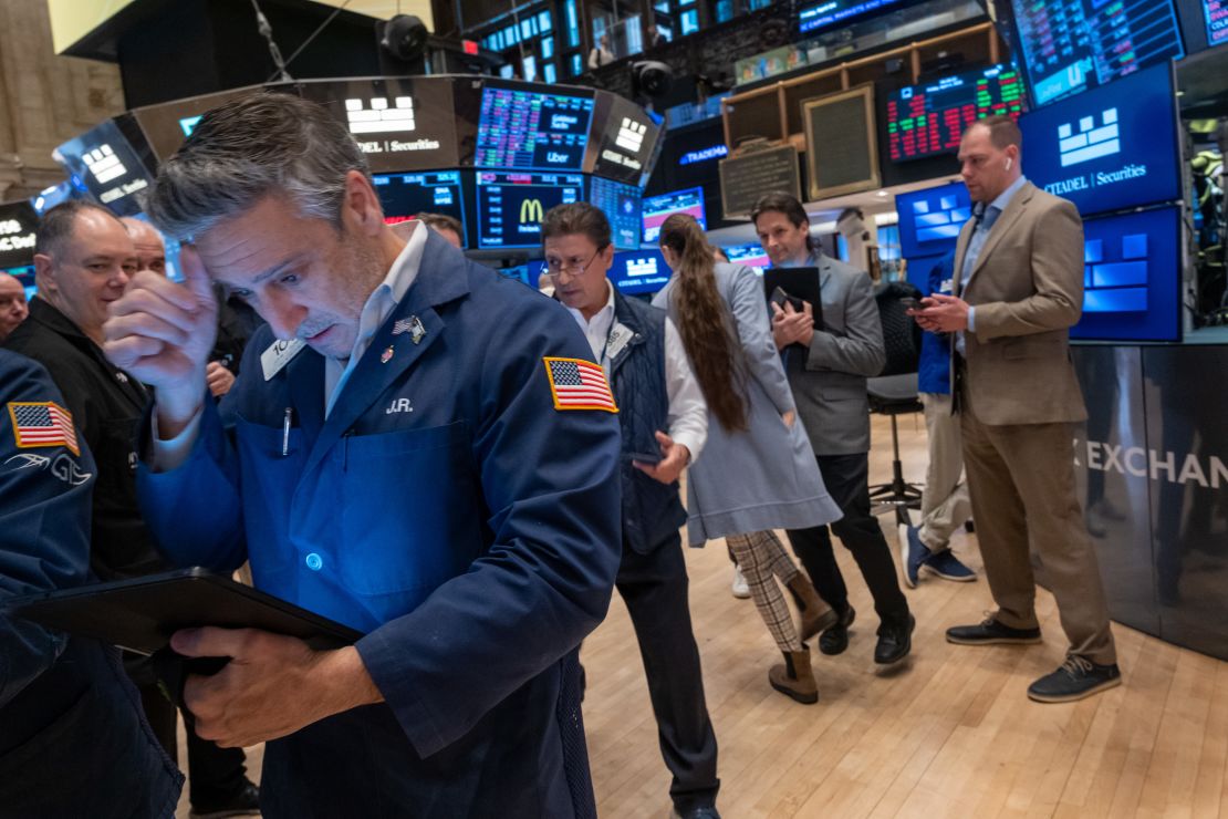 Traders work on the floor of the New York Stock Exchange on April 4 as the world continues to react to President Donald Trump's sweeping new tariffs.