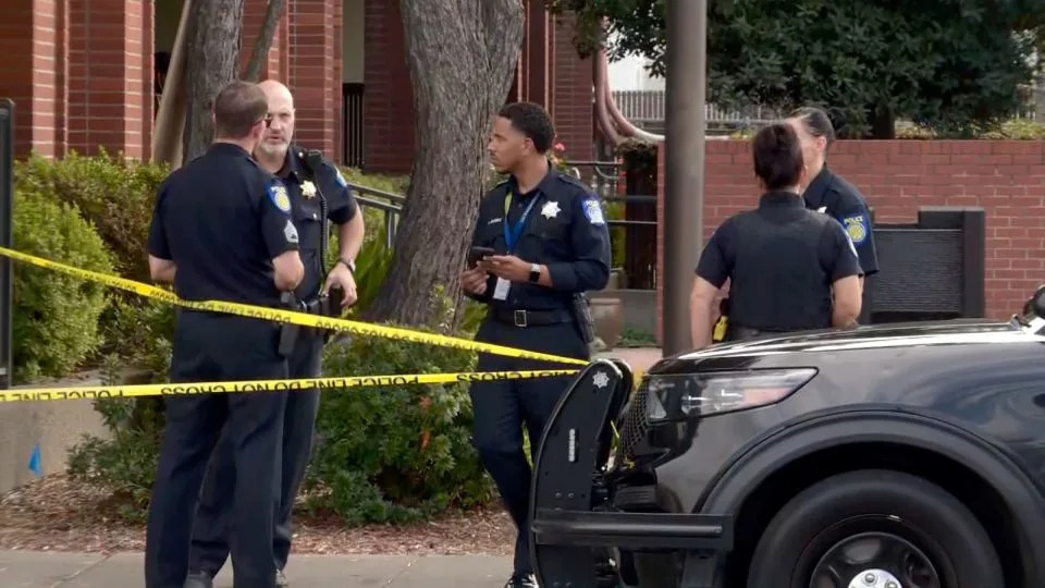 Police gather at KXTV, an ABC affiliate, where shots were fired on Friday, September 19, in Sacramento, California. - KCRA