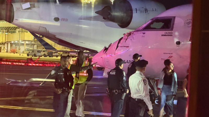 2 regional Delta jets collide at LaGuardia airport with a wing slamming into a cockpit window
