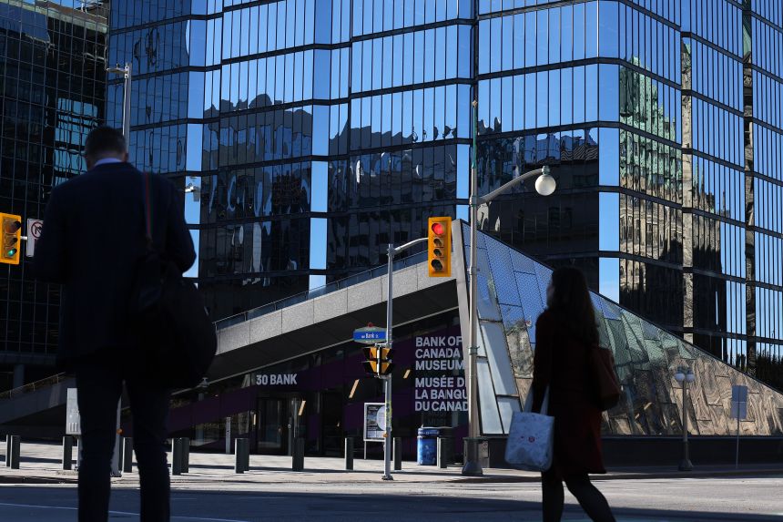 The Bank of Canada building in Ottawa, Ontario, on October 29, 2025. The Bank of Canada cut interest rates as it sees damage from US tariffs persisting, but signaled that borrowing costs are roughly at the right place as long as its forecasts materialize.