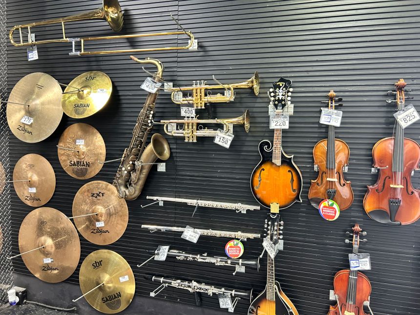 Musical instruments for sale at an EZPawn in Austin, Texas.