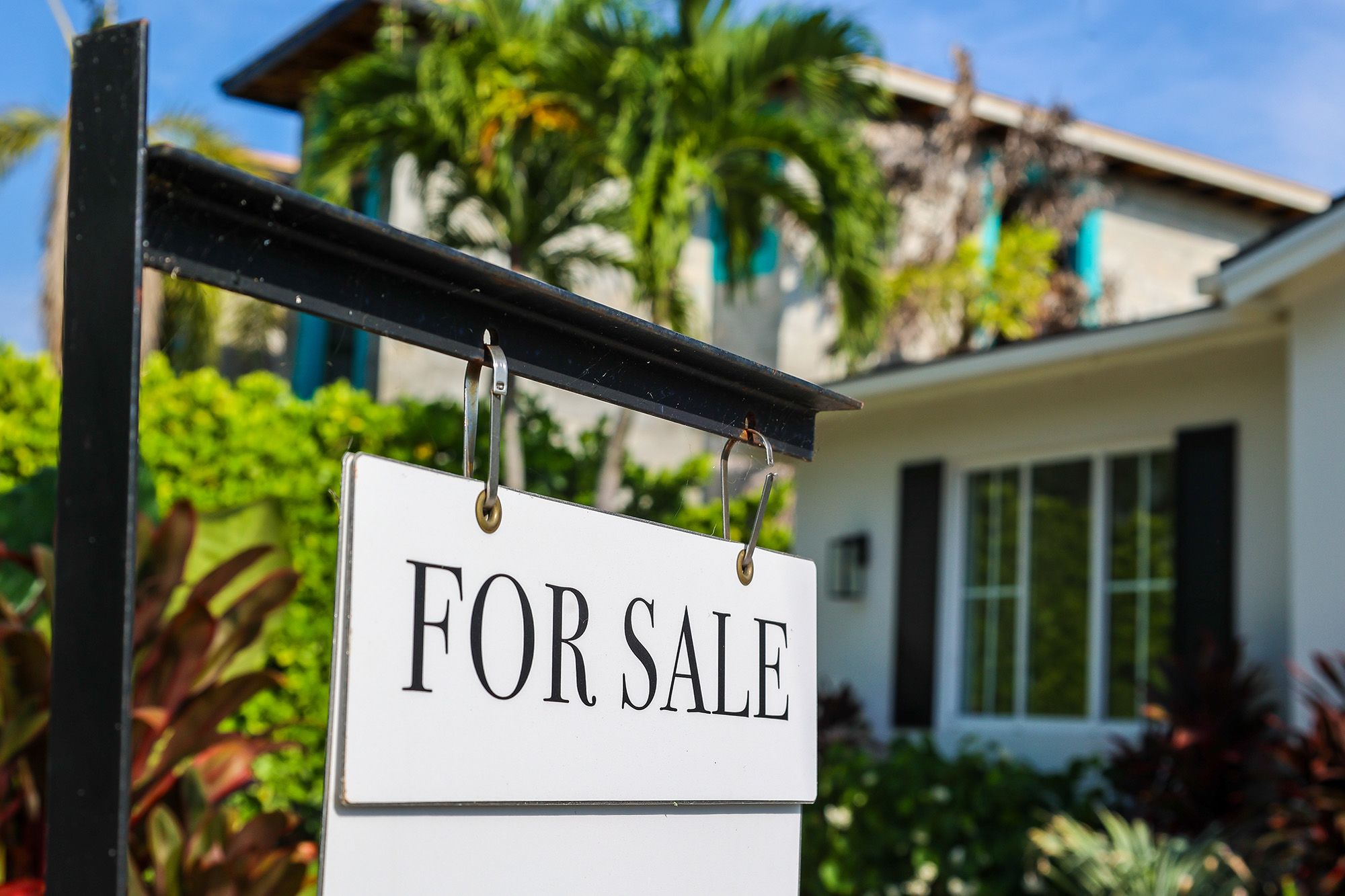 <i>Nick Oxford/Bloomberg/Getty Images via CNN Newsource</i><br/>A worker hangs drywall for a new home under construction at a development in Yukon