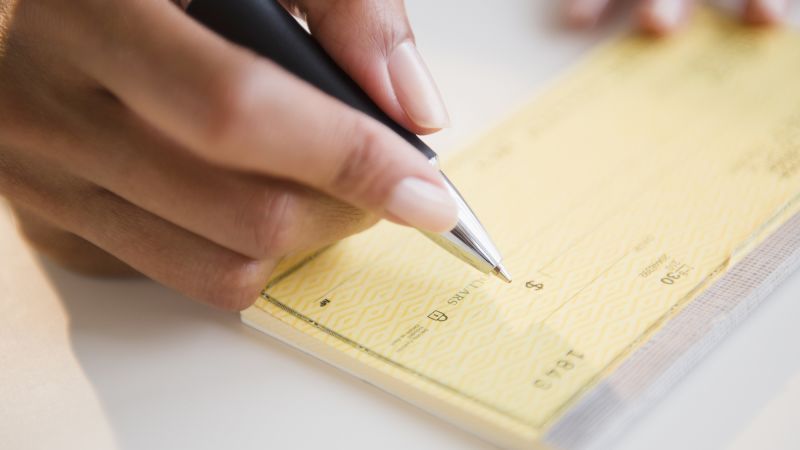 Could paper checks be on the way out, like the penny?