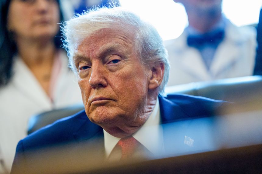 President Donald Trump at an executive order signing in the Oval Office of the White House in Washington, DC, on December 18, 2025.