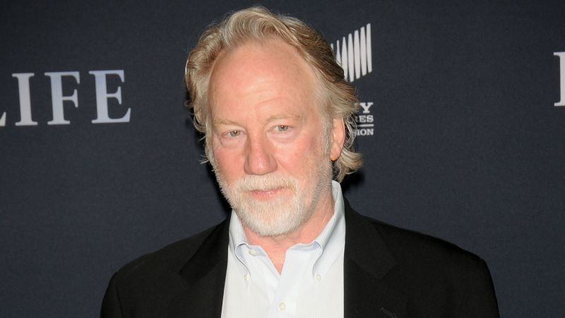 Director Timothy Busfield turns himself in to New Mexico authorities after being sought on child sex abuse charges