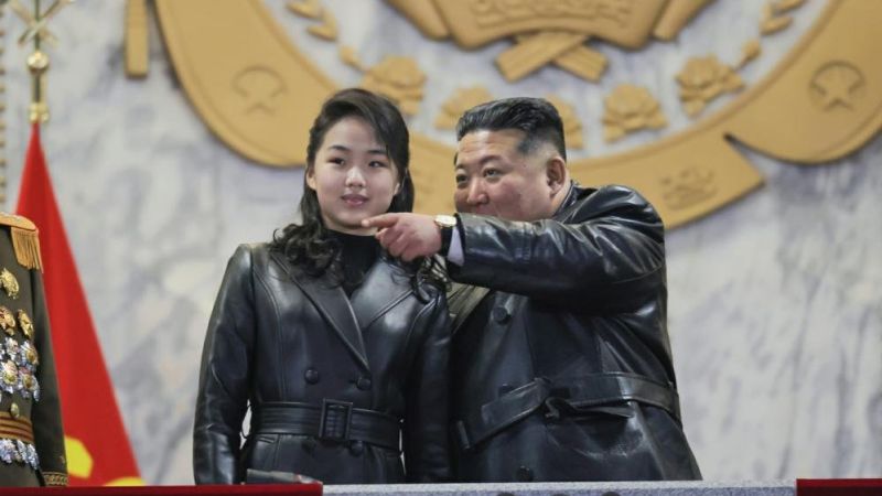 Kim Jong Un vows to strengthen nuclear program, watches military parade with daughter