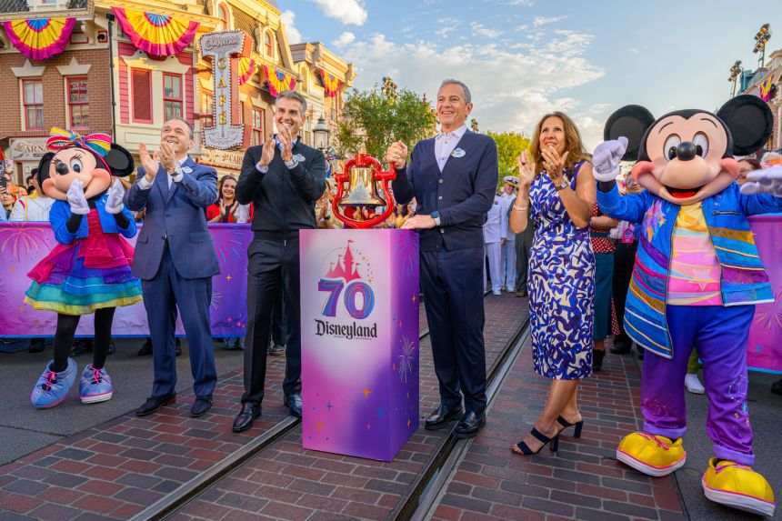 D'Amaro (left of center) takes over from Bob Iger (center), whose name has been practically synonymous with Disney for the past 25 years.