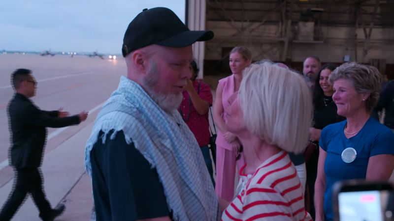 US citizen, who was imprisoned in Afghanistan, arrives back in the US