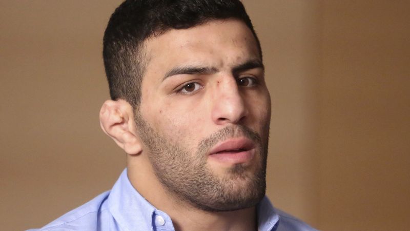 This Olympian defied Iran’s regime. Now he fears for the country’s women’s soccer team.