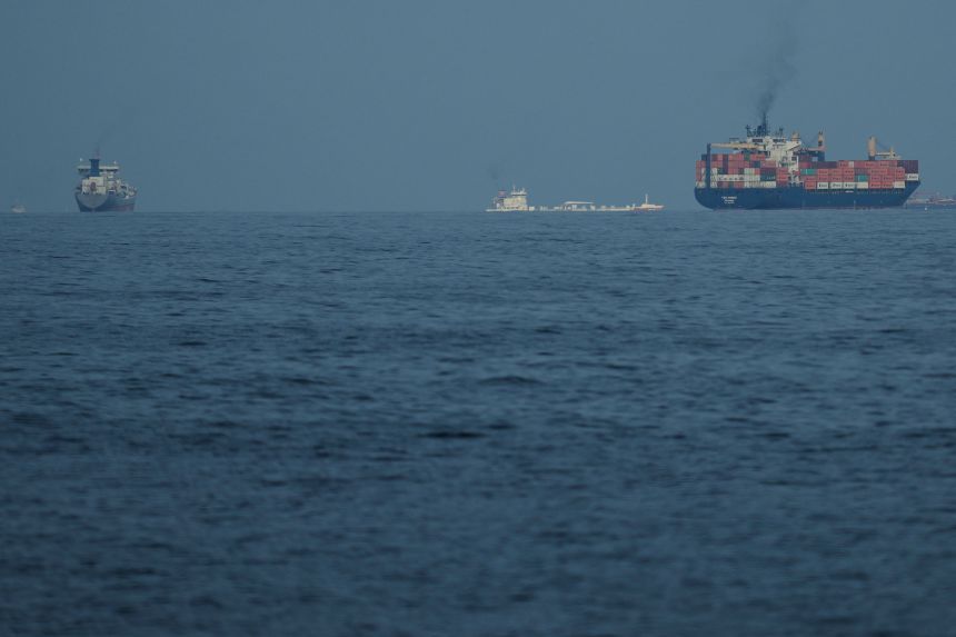 Ships line up in the Strait of Hormuz on March 11, 2026.