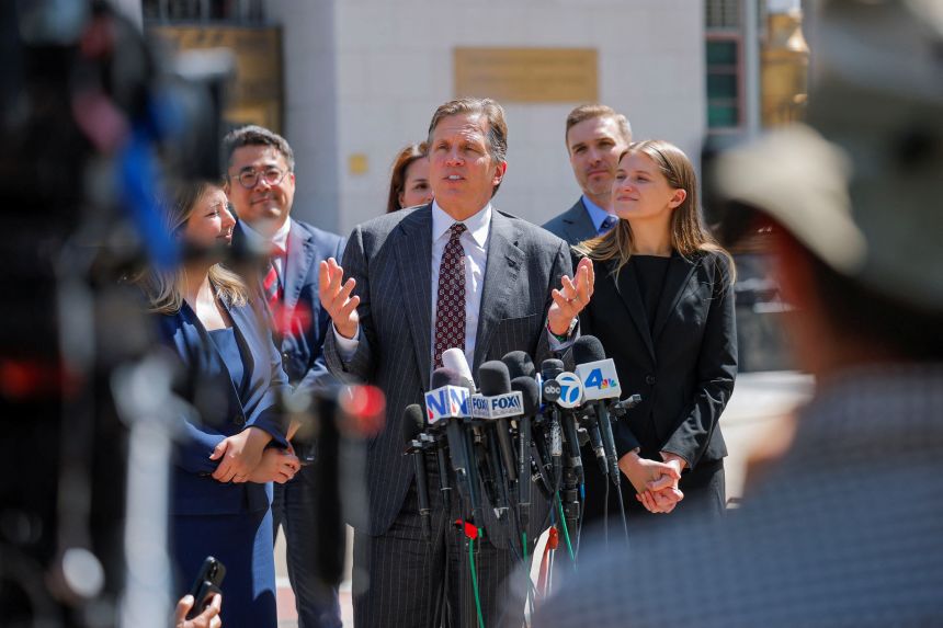 Plaintiff's lawyer Mark Lanier speaks with the media outside the court after the jury found Meta and Google liable in a key test case accusing the companies of harming a young woman's mental health in Los Angeles on March 25, 2026.