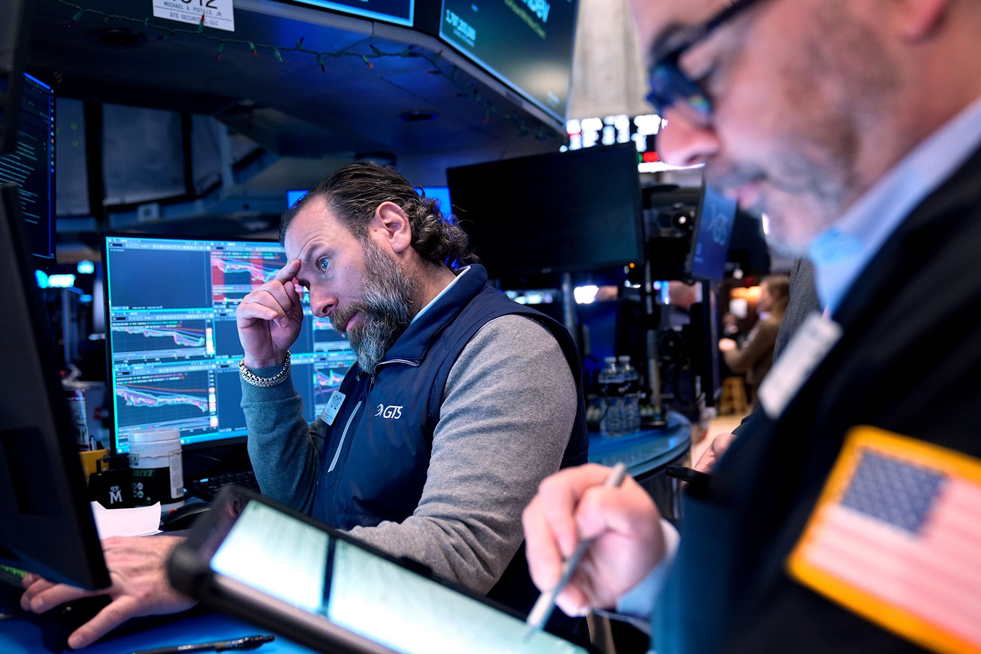 Seth Wenig/AP via CNN NewsourceTraders work on the floor at the New York Stock Exchange Tuesday.