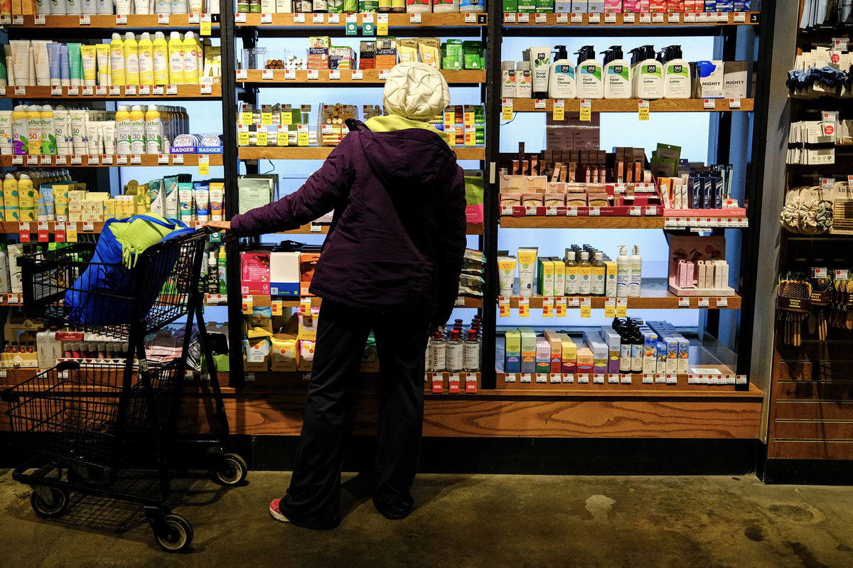 Charly Triballeau/AFP/Getty Images via CNN NewsourceA customer shops for toiletries in a supermarket in New York on January 22.