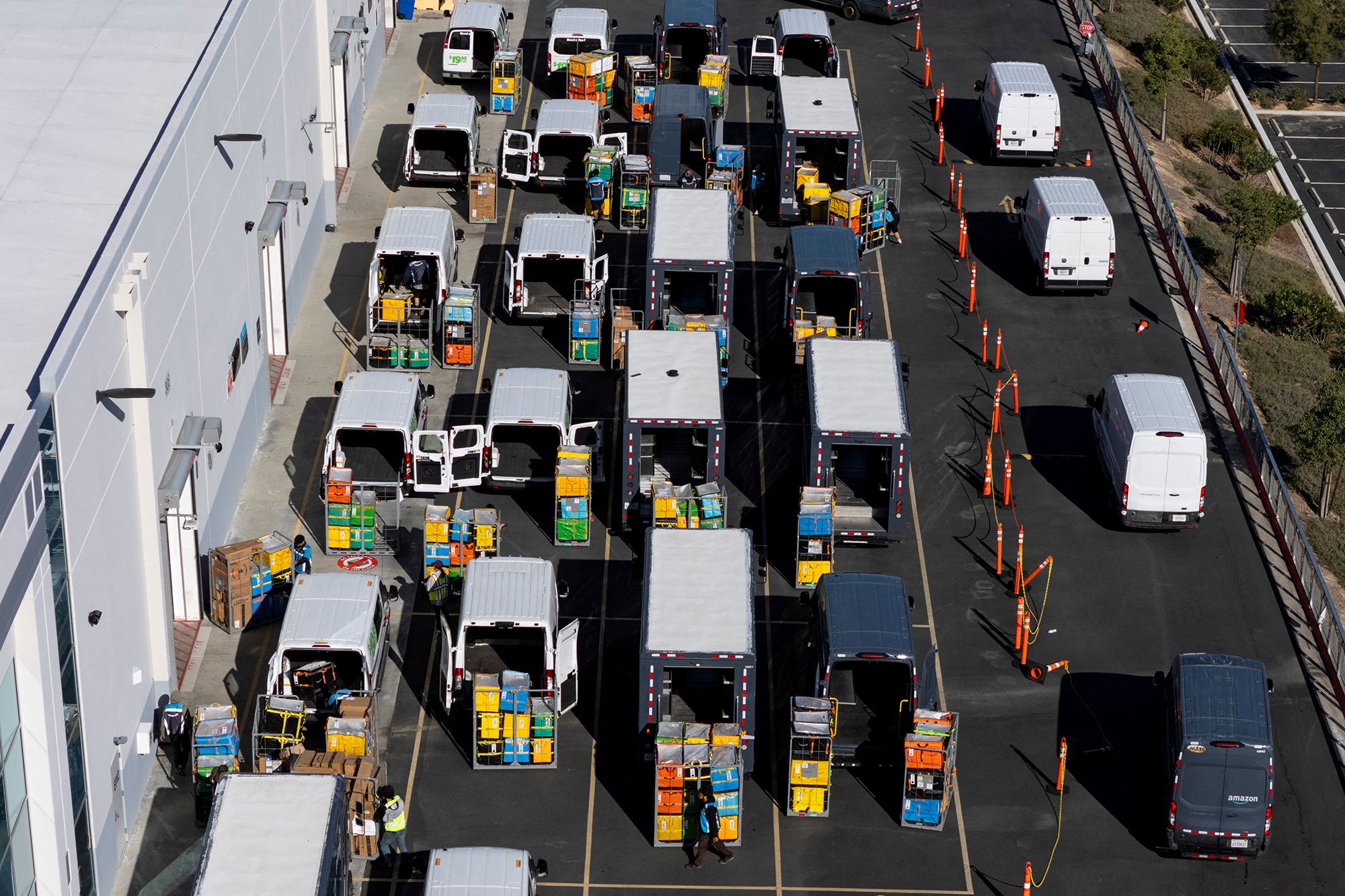 Daniel Cole/Reuters via CNN NewsourceAmazon is charging third-party sellers that use its distribution services a 3.5% fuel surcharge.