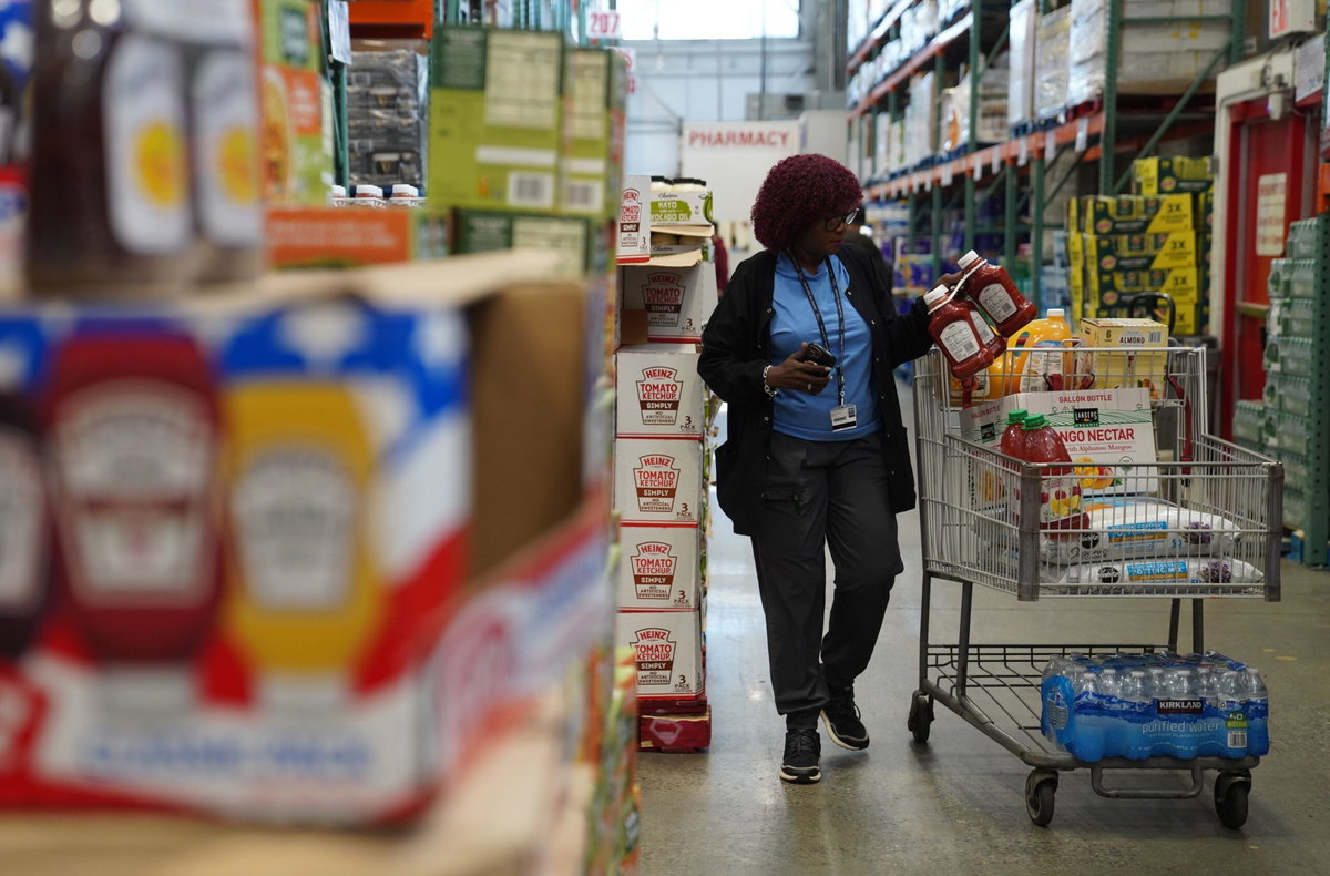 Zhang Fengguo/Xinhua/Getty Images via CNN NewsourceA woman shops at a supermarket in New York on April 10