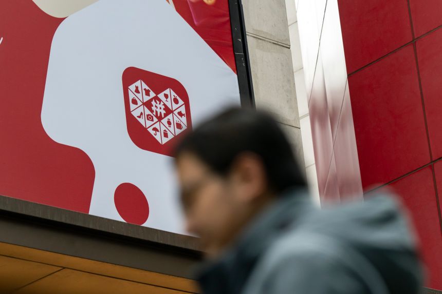 An advertisement for PDD Holdings Inc. in Shanghai, China, on January 26, 2026.