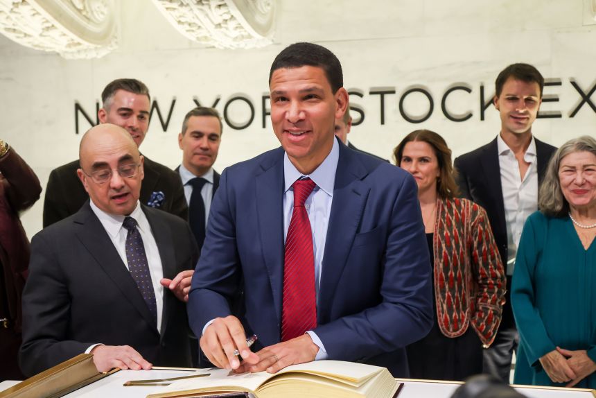 Robert Reffkin, chairman and chief executive officer of Compass Inc., center, on the floor the New York Stock Exchange on February 2, 2026.