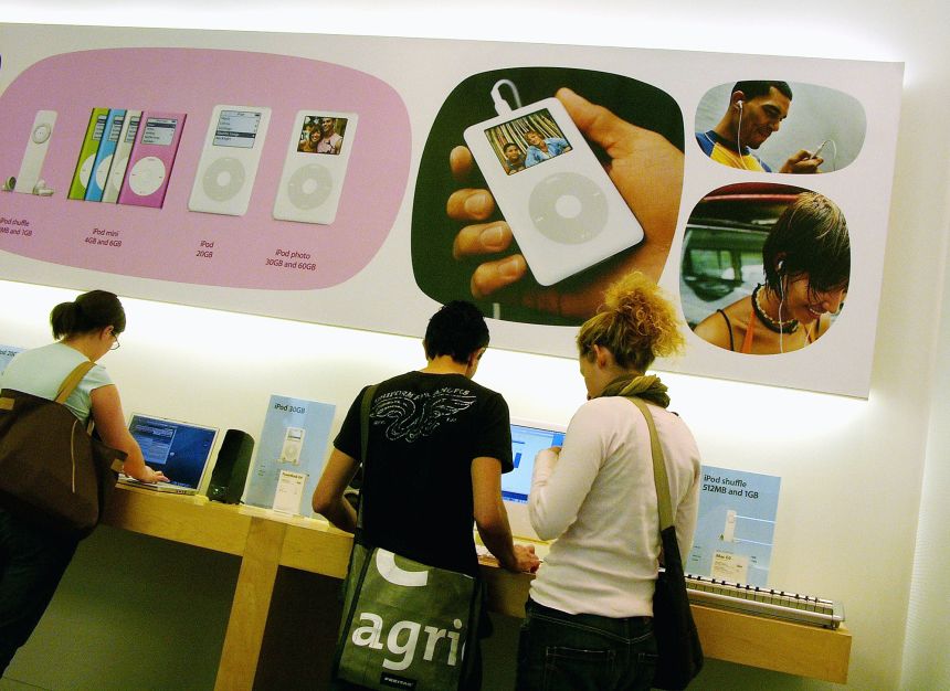 People look at the latest iPods at the Apple store April 19, 2005 in New York City.