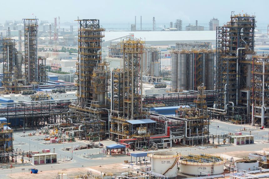 Cracking towers stand at the Ruwais refinery and petrochemical complex, operated by Abu Dhabi National Oil Co. (ADNOC), in Al Ruwais, United Arab Emirates, on Monday, May 14, 2018.