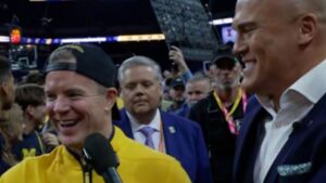 Michigan head coach reacts after team wins NCAA championship