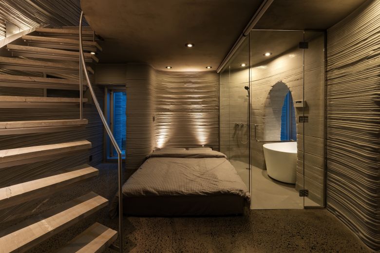 The house takes inspiration from natural cave formations for its design.