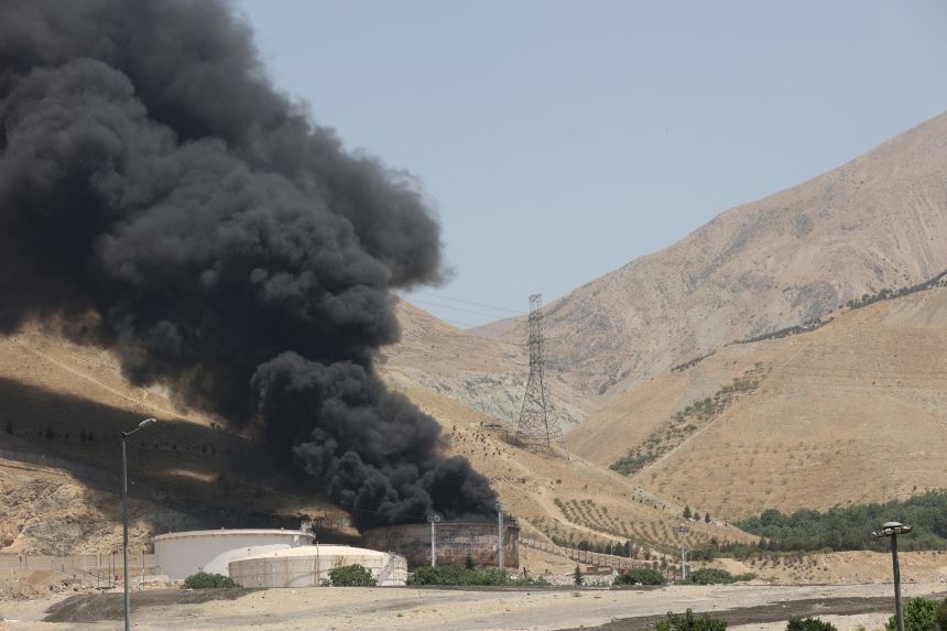 Smoke rises following what Iran says was an Israeli attack on Sharan Oil depot in Tehran, Iran, June 16, 2025.