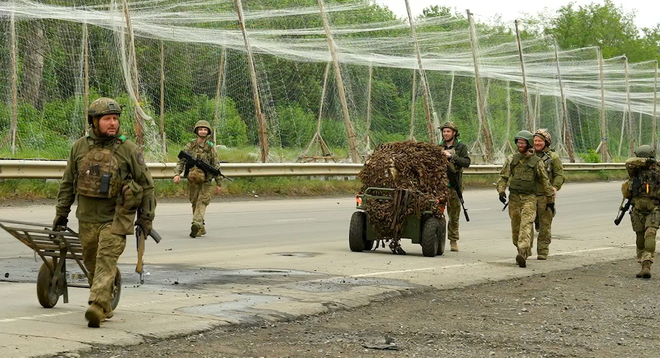 Dodging the drones: Aerial attackers stalk Ukrainian troops, and a CNN team, on a key road to the front