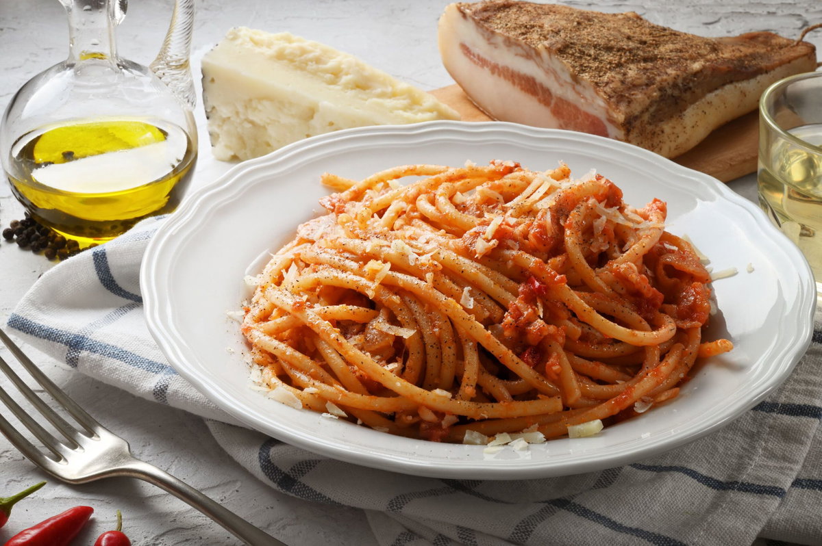 <i>fabiomax/iStockphoto/Getty Images via CNN Newsource</i><br/>Five-ingredient Bucatini all'Amatriciana can be a perfect dinner for one.
