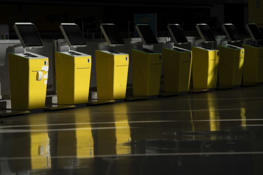 The Spirit Airlines ticket counter at Detroit Metro Airport is closed down after the airline shut down overnight on May 2.