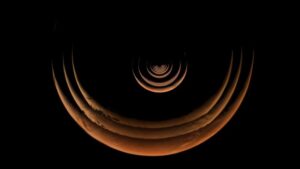 Mars is a glowing crescent in new photos captured during flyby