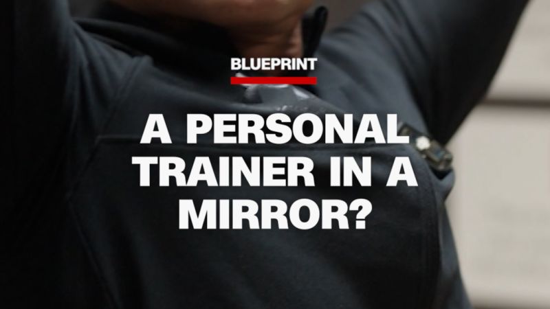 Watch CNN producer take on an AI workout mirror