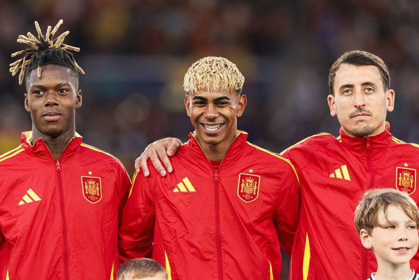 Lamine Yamal of Spain (C) getting into the field with his teammates Nico Williams (L) and Mikel Oyarzabal of Spain (R) during the UEFA Nations League 2025 semifinal match between Spain and France at Stuttgart Arena on June 5, 2025, in Stuttgart, Germany.