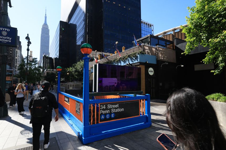 A blue and orange subway entrance honors the New York Knicks near Madison Square Garden in New York City on June 2, 2026.