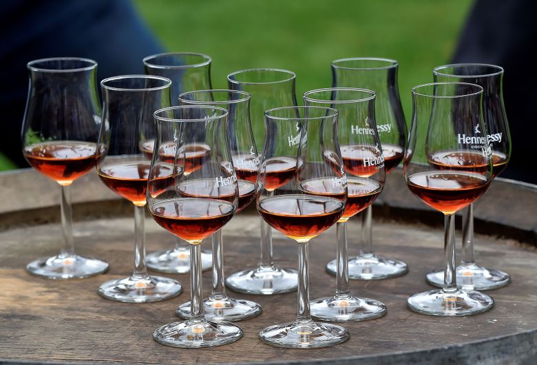 Glasses of cognac are displayed for a tasting session at the cognac estate of Hennessy company in Cognac.