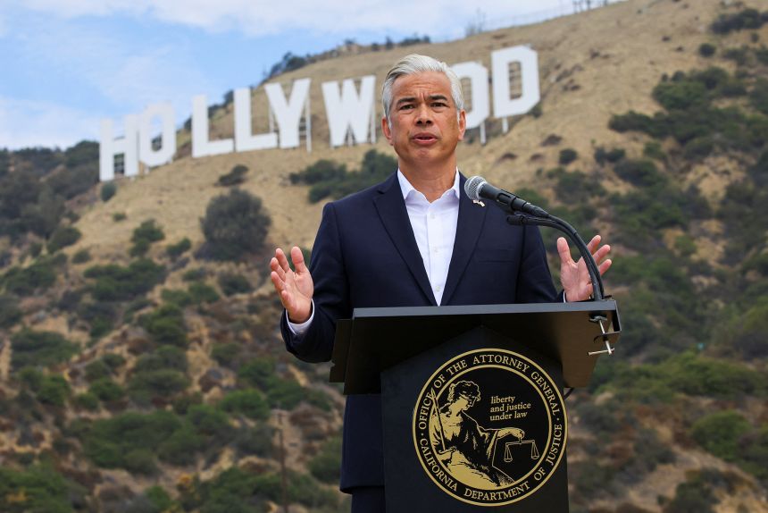 California Attorney General Rob Bonta stood in front of the Hollywood sign during Monday’s press conference announcing the lawsuit to block Paramount–WBD.