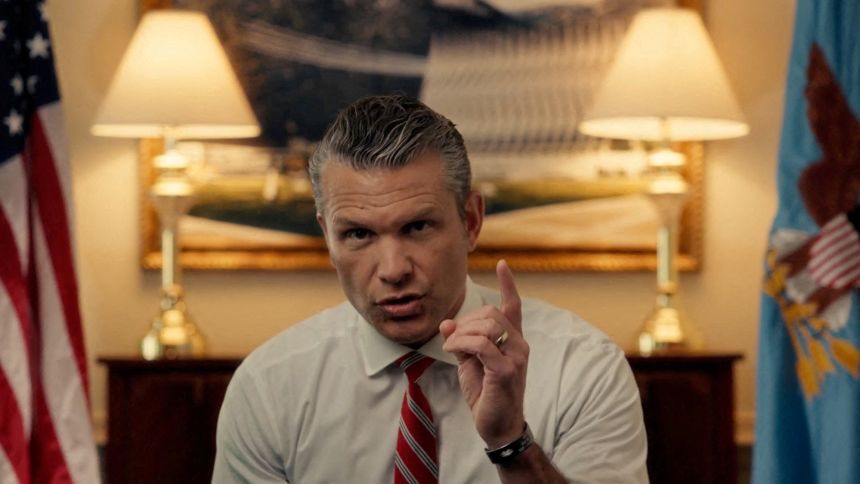Defense Secretary Pete Hegseth gestures as he announces mandatory annual testosterone screening for troops 30 years old or older.