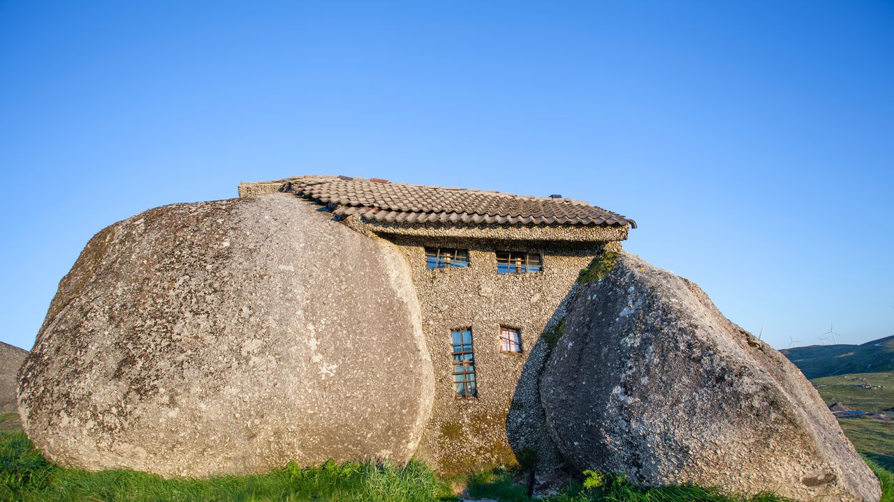 This fantastical house built between four giant boulders has become one of Portugal's biggest attractions