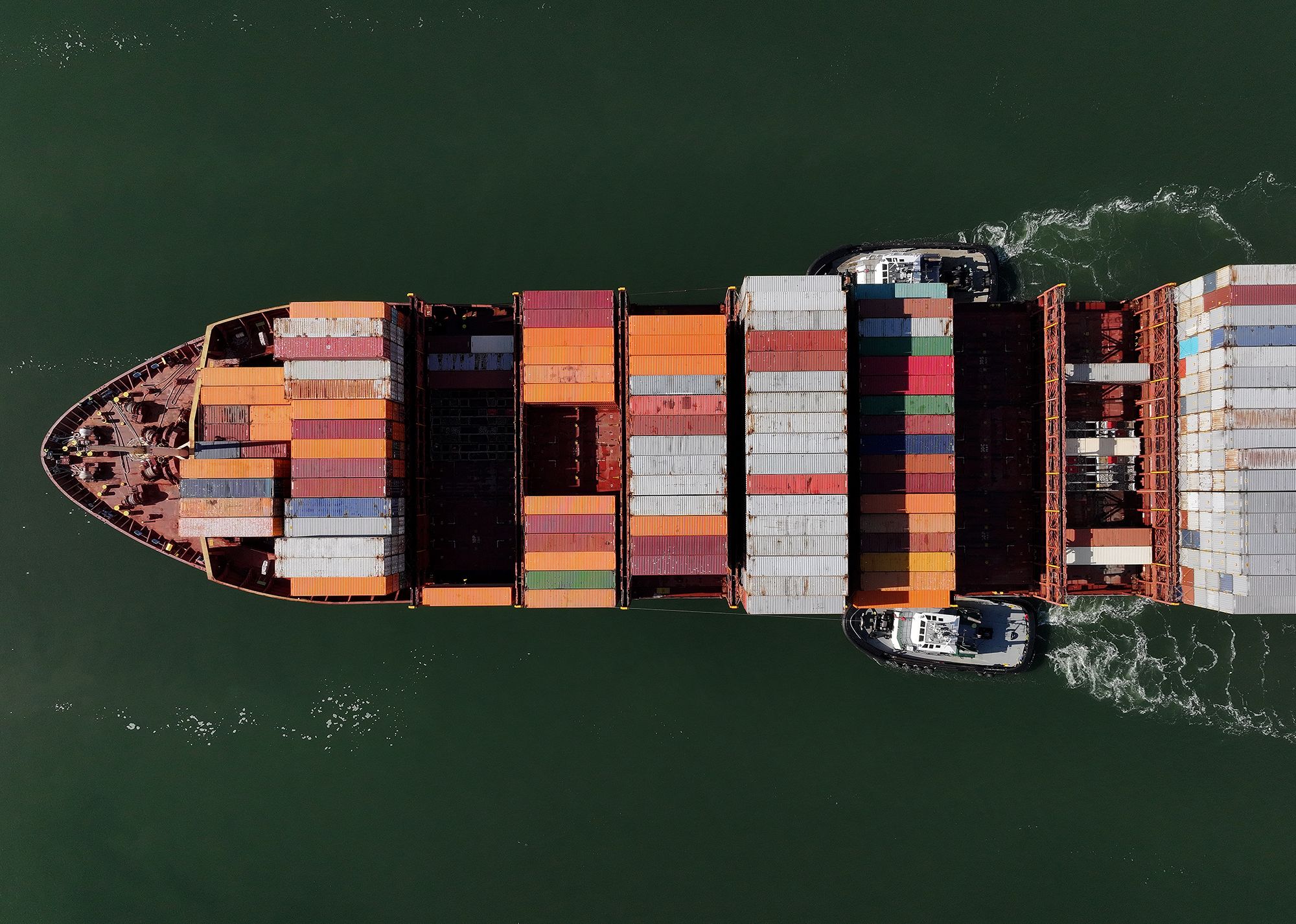 Justin Sullivan/Getty Images via CNN NewsourceA container ship arrives at the Port of Oakland on August 1