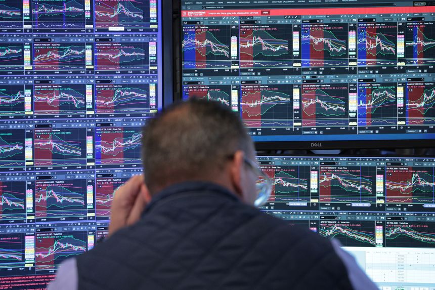 Traders work on the New York Stock Exchange floor on June 10, 2026 in New York City.