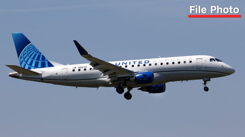 FAA investigating after a passenger tried to open cabin door on regional jet, forcing an emergency landing